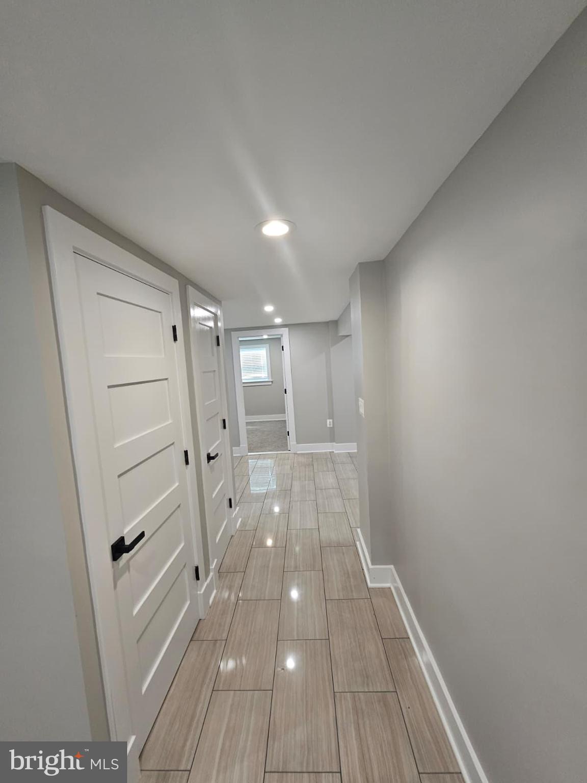2909 Chapelview Drive Silver Spring, MD 20904 - Photo 25 of 39 a view of a hallway with wooden floor