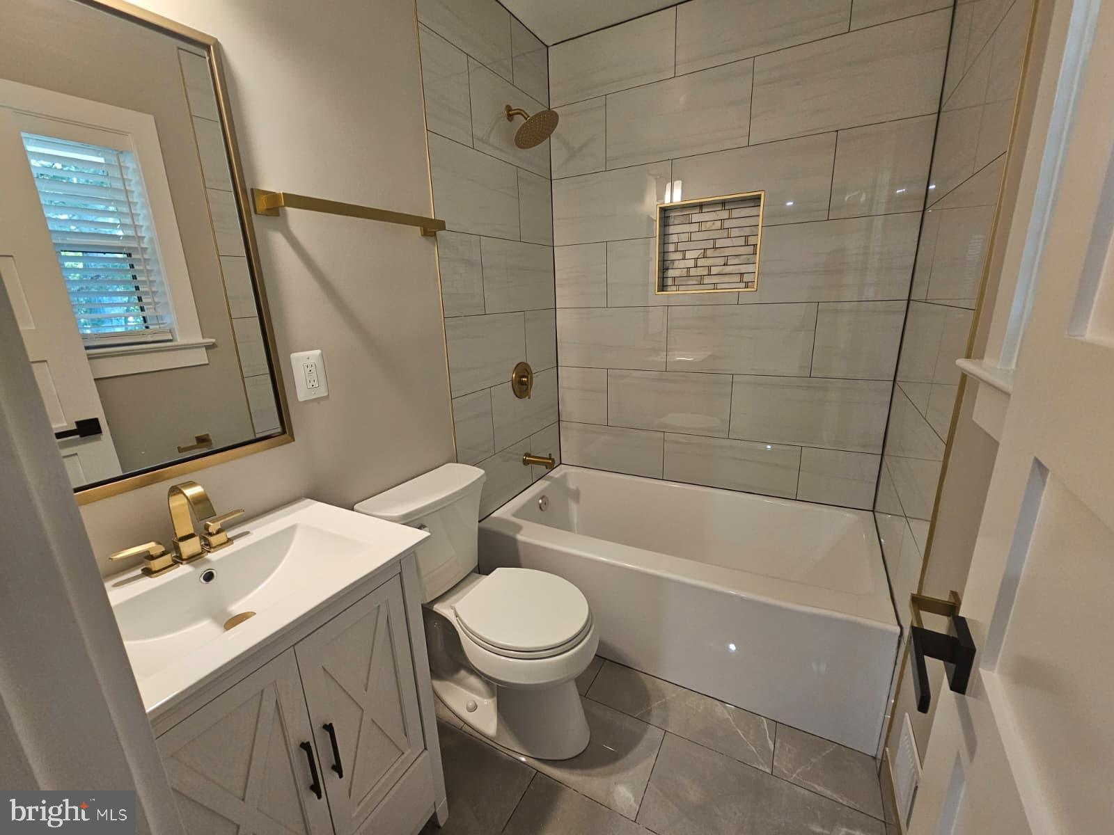 2909 Chapelview Drive Silver Spring, MD 20904 - Photo 29 of 39 a bathroom with a sink toilet and shower