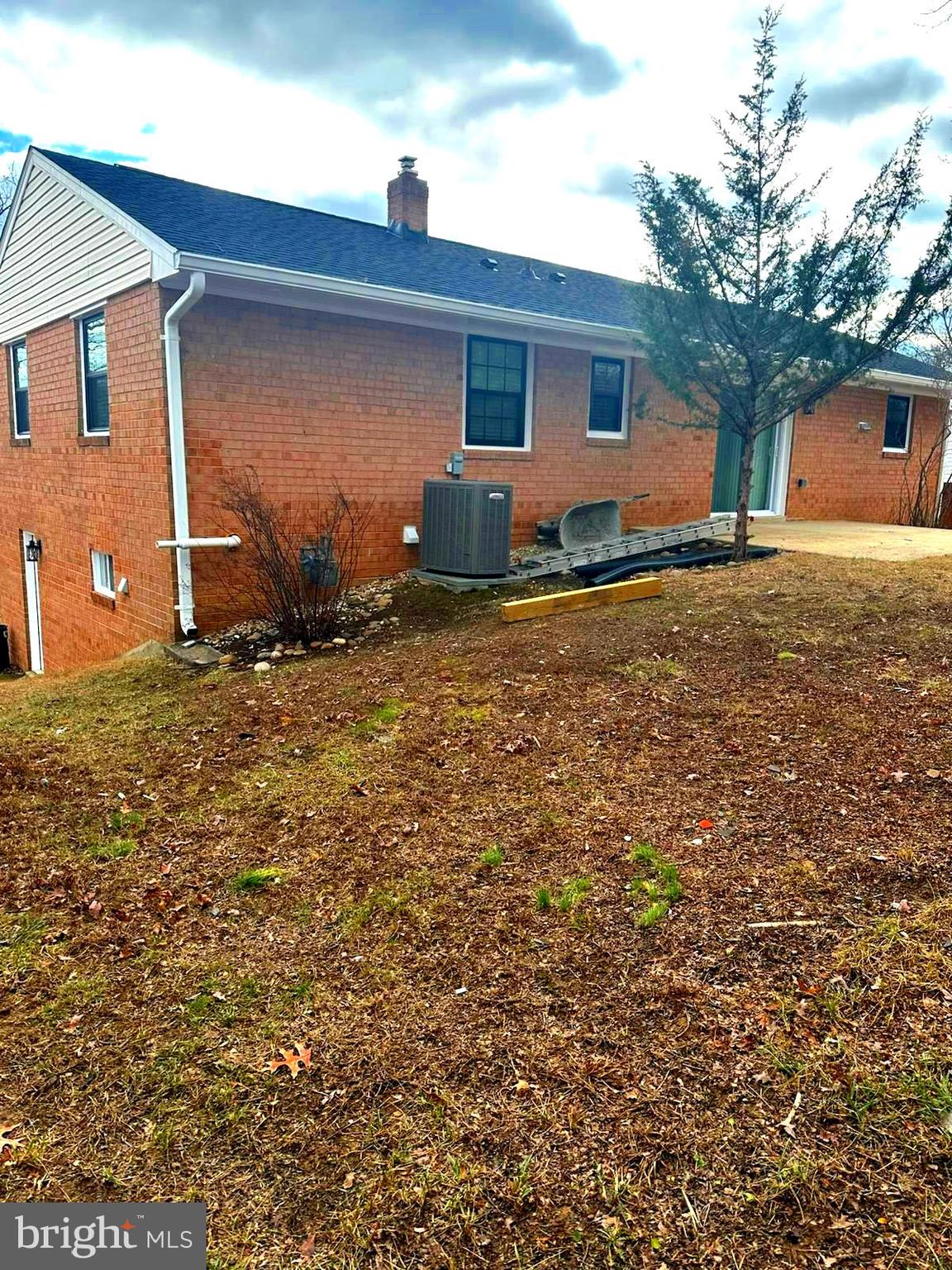 2909 Chapelview Drive Silver Spring, MD 20904 - Photo 3 of 39 a backyard of a house with table and chairs