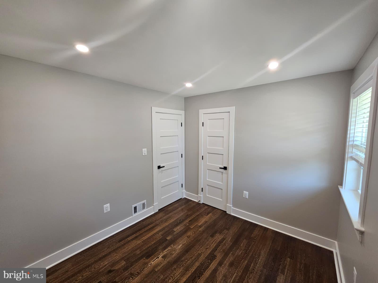 2909 Chapelview Drive Silver Spring, MD 20904 - Photo 31 of 39 wooden floor in an empty room with windows
