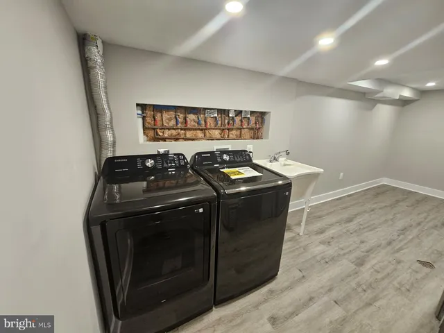 a kitchen with a stove and a sink