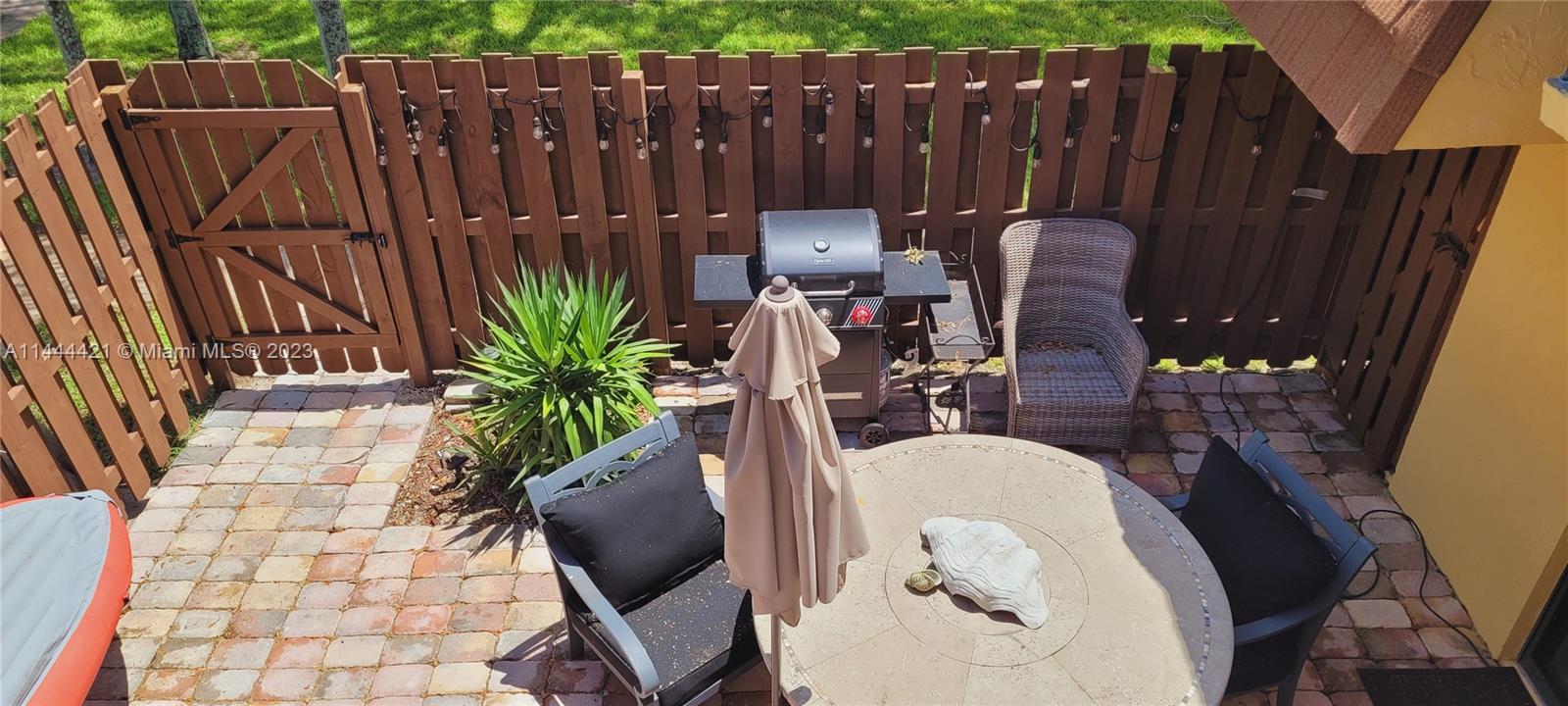825 Center Street, Unit 28C Jupiter, FL 33458 - Photo 17 of 29 a view of outdoor space with seating area