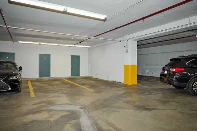 a view of parking area and car parked