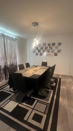 a bed room with a bed and a table