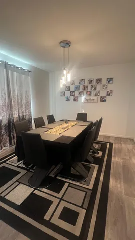 a bed room with a bed and a table