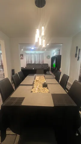 a view of a livingroom with furniture and window