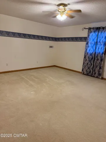 a view of a room with a chandelier