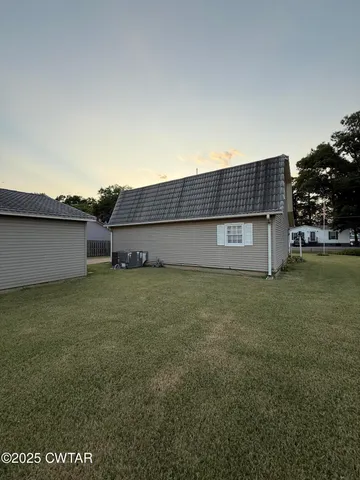 a view of outdoor space and yard
