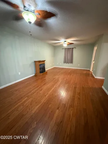 a view of a livingroom with a staircase