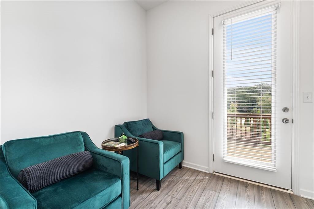 1182 Edwin Lane Sugar Hill, GA 30518 - Photo 13 of 32 a living room with furniture and a window