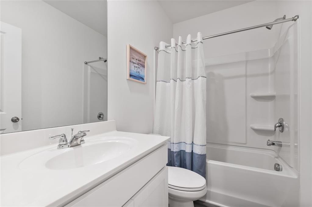 1182 Edwin Lane Sugar Hill, GA 30518 - Photo 23 of 32 a bathroom with a sink toilet and shower