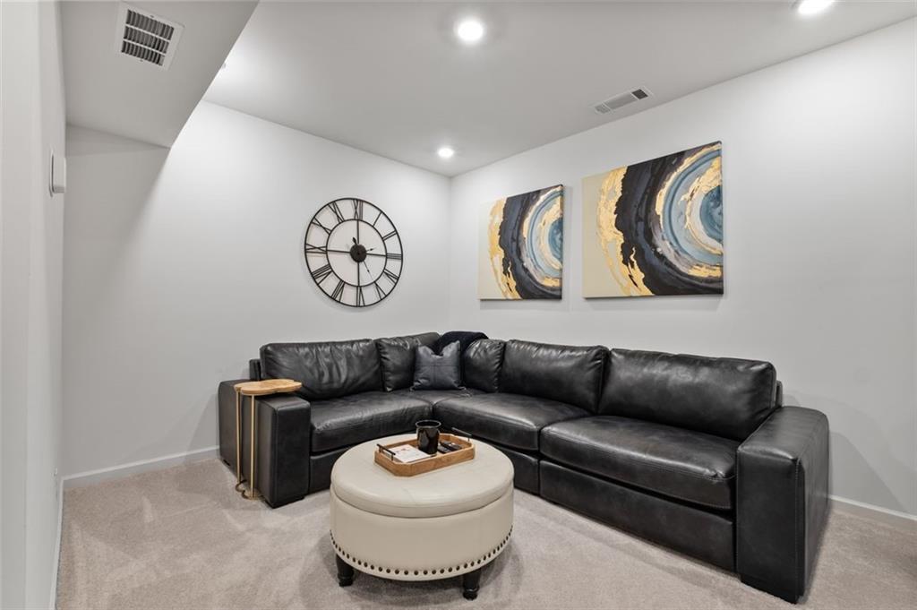 1182 Edwin Lane Sugar Hill, GA 30518 - Photo 28 of 32 a living room with furniture and a window