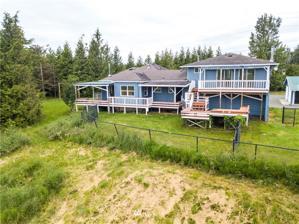 2419 East Badger Road Everson, WA 98247 - Photo 25 of 34 a view of a house with pool in front of it