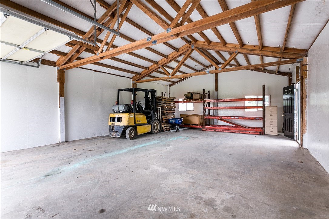 2419 East Badger Road Everson, WA 98247 - Photo 5 of 34 a view of a room with wooden walls