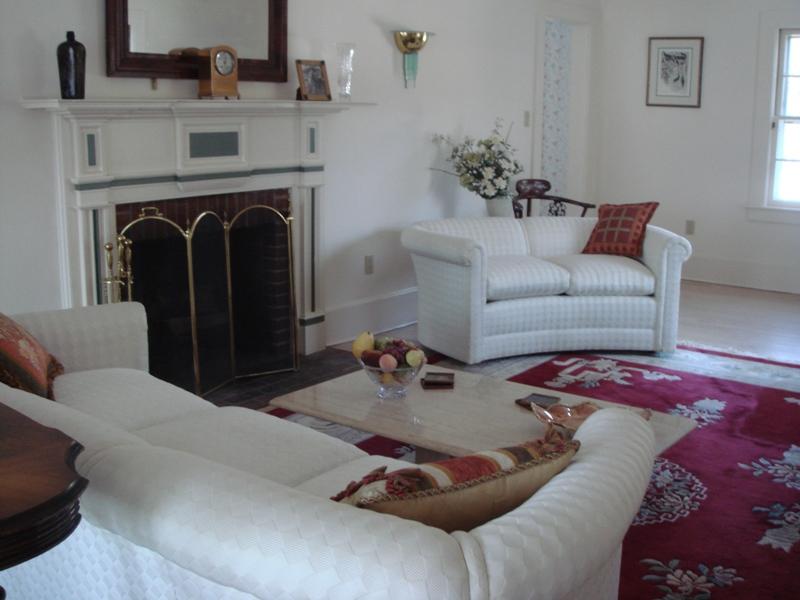 2087 Cold Spring Road Williamstown, MA 01267 - Photo 5 of 20 a living room with furniture and a fireplace