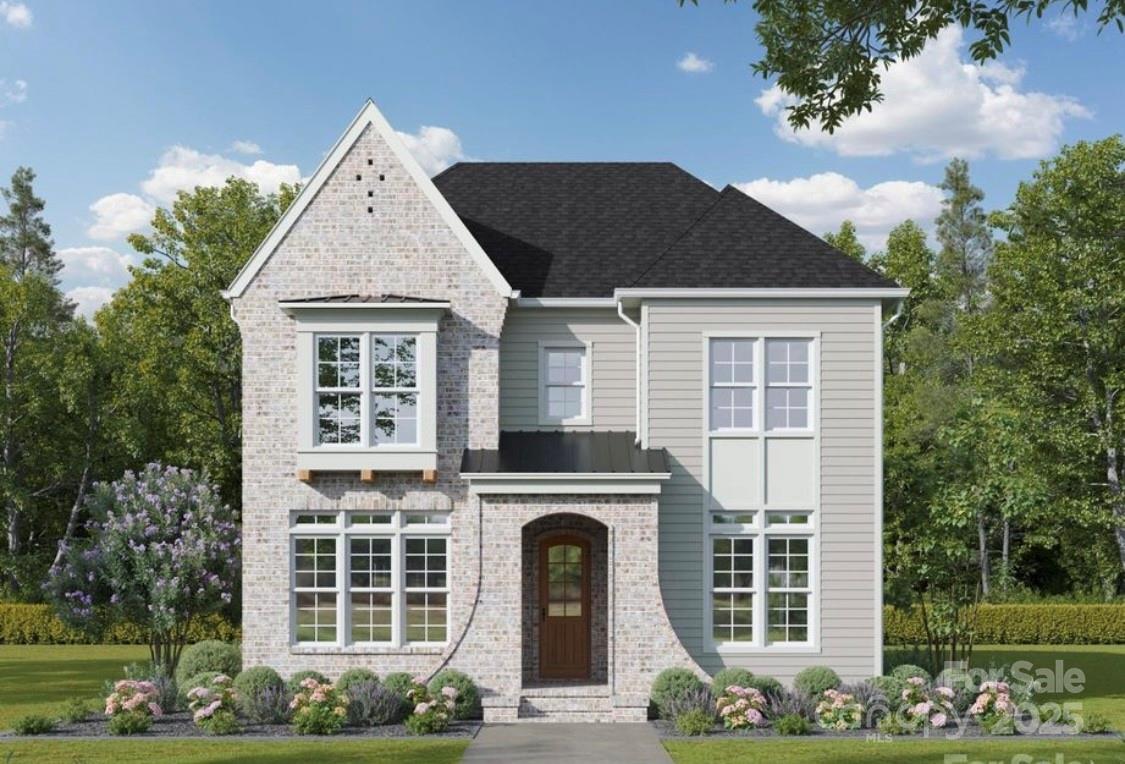 front view of a house with a street