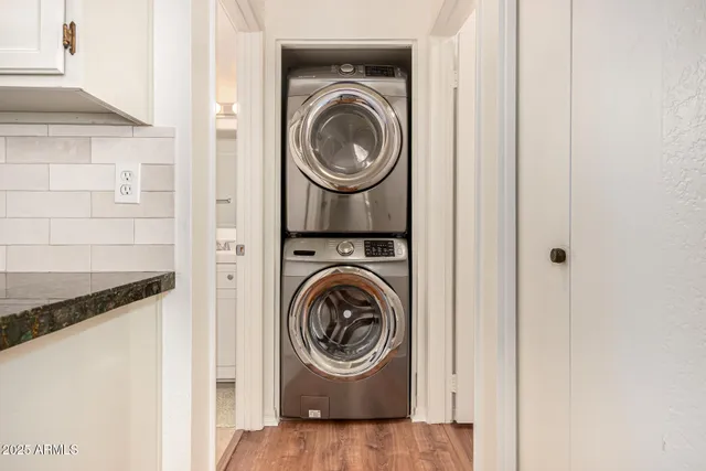 a utility room with dryer and washer