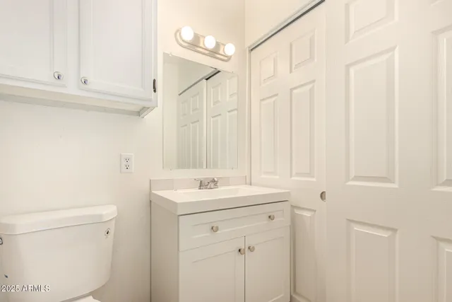 swimming pool view with a seating space