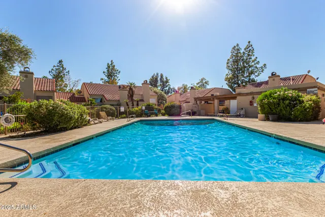 a view of a swimming pool with an outdoor space