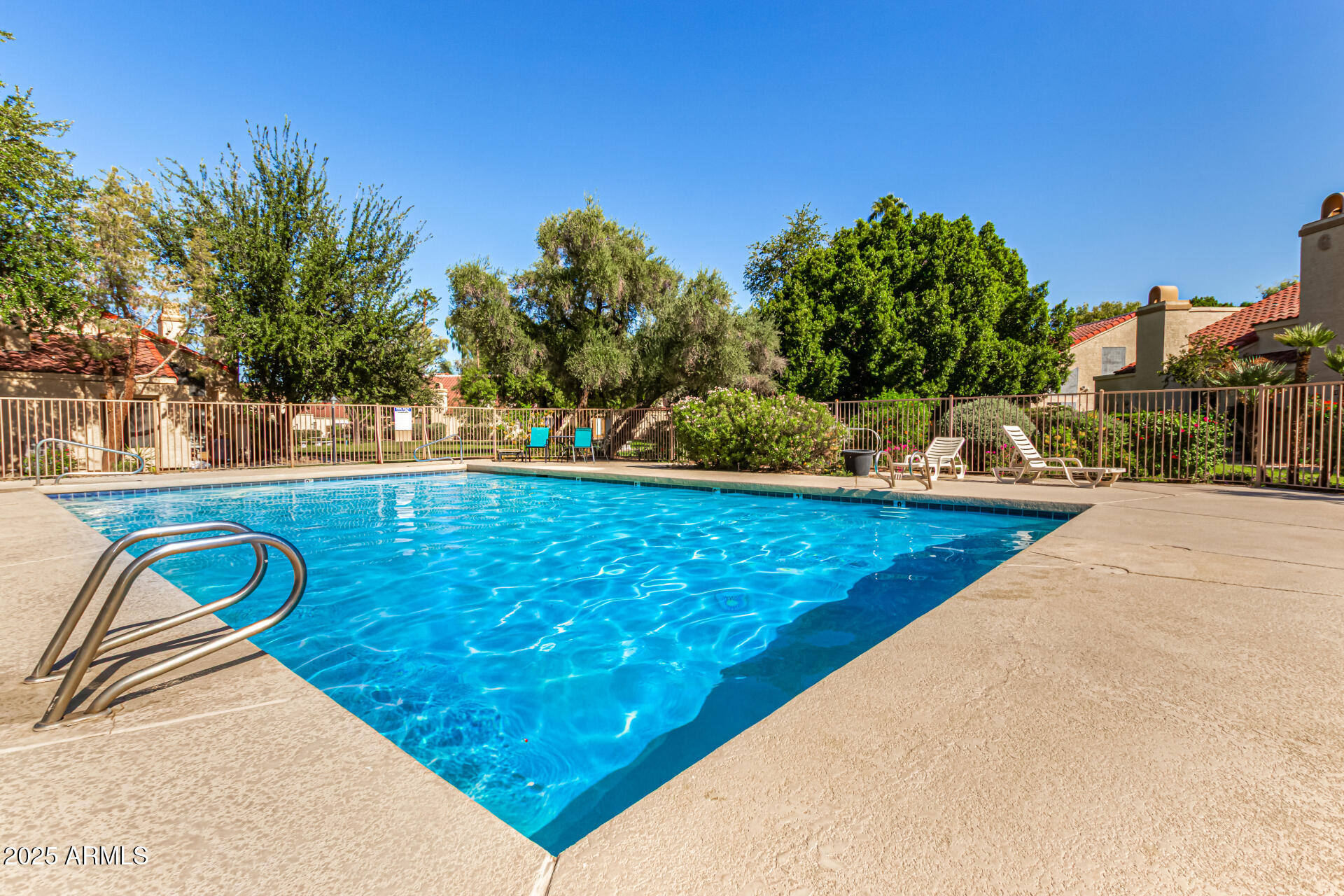 602 North May, Unit 49 Mesa, AZ 85201 - Photo 30 of 32 a view of a swimming pool with an outdoor space