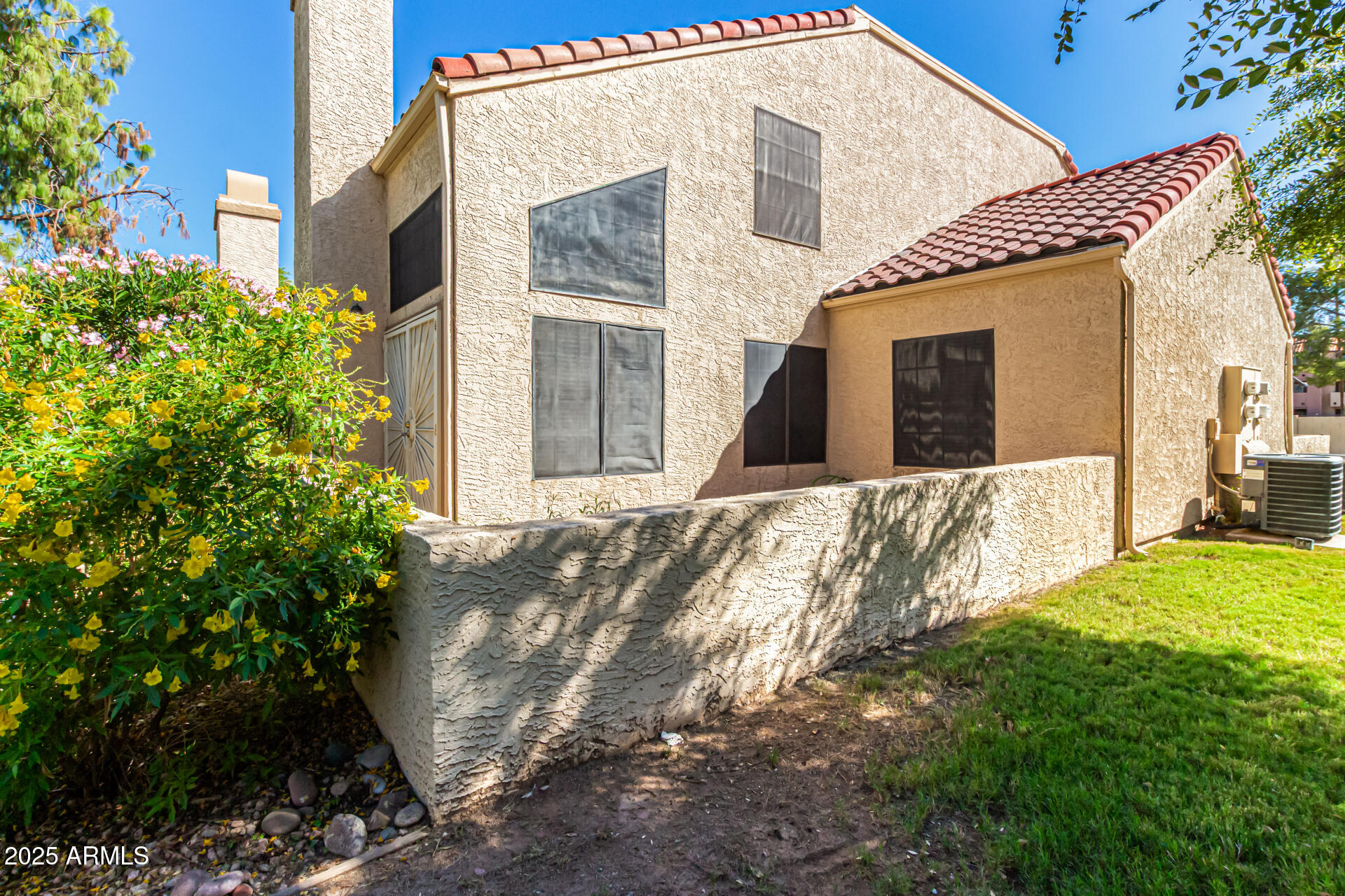 602 North May, Unit 49 Mesa, AZ 85201 - Photo 4 of 32 a view of house with yard