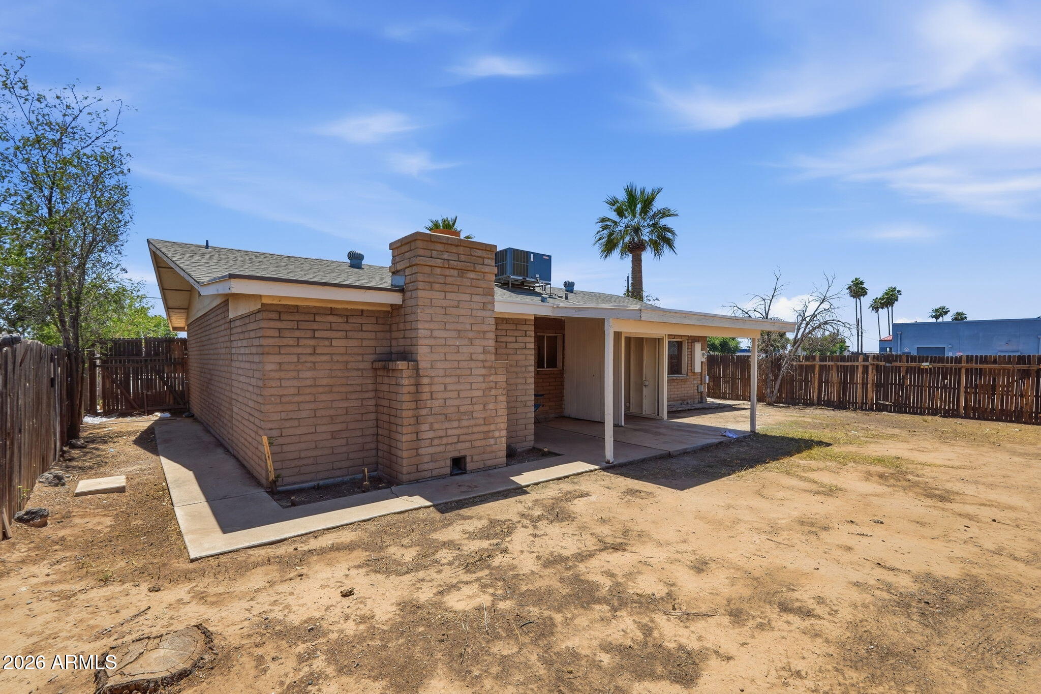 6452 West Thomas Road Phoenix, AZ 85033 - Photo 27 of 30 a view of a house with a yard