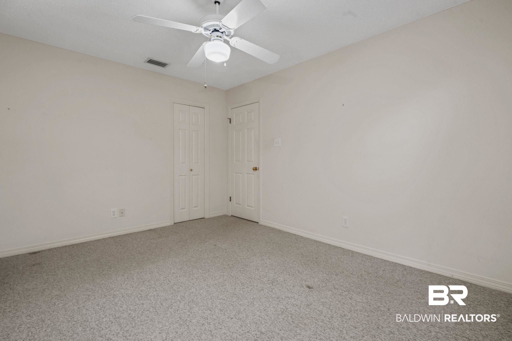 1340 Wellsley Court Mobile, AL 36695 - Photo 26 of 37 Carpeted empty room with baseboards and ceiling fan