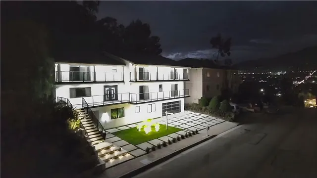 a view of a balcony with chairs