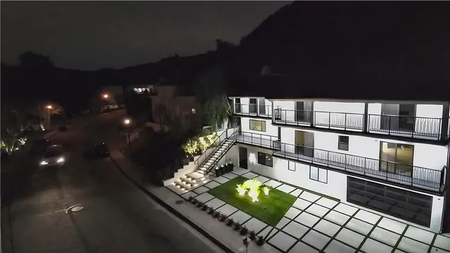 a house with trees in front of it