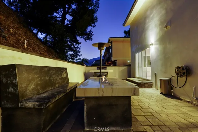 a bathroom with a shower and a sink