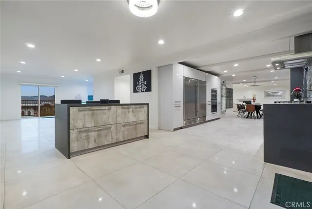 a view of kitchen with furniture and window