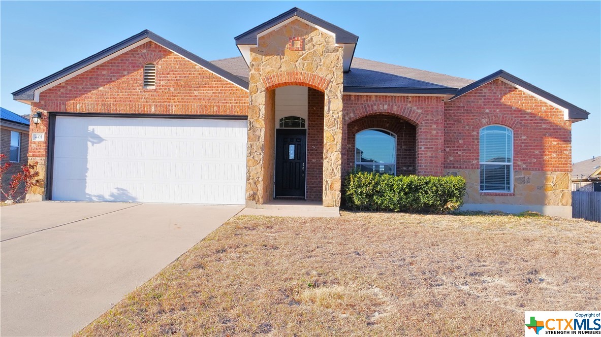 401 Rowdy Drive Killeen, TX 76542 - Photo 1 of 1 a front view of a house with a yard