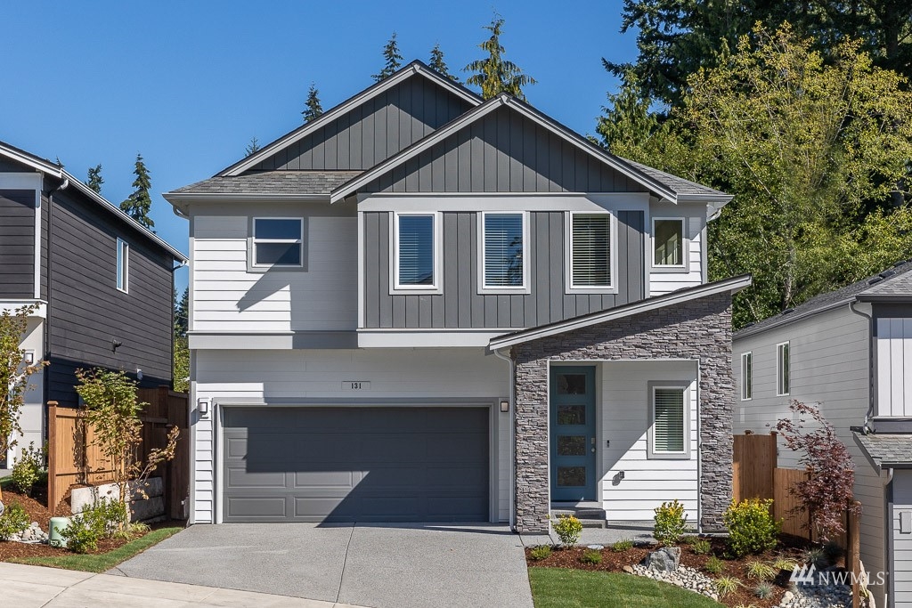 113 177th Street Southwest Bothell, WA 98012 - Photo 2 of 32 a front view of a house with garden