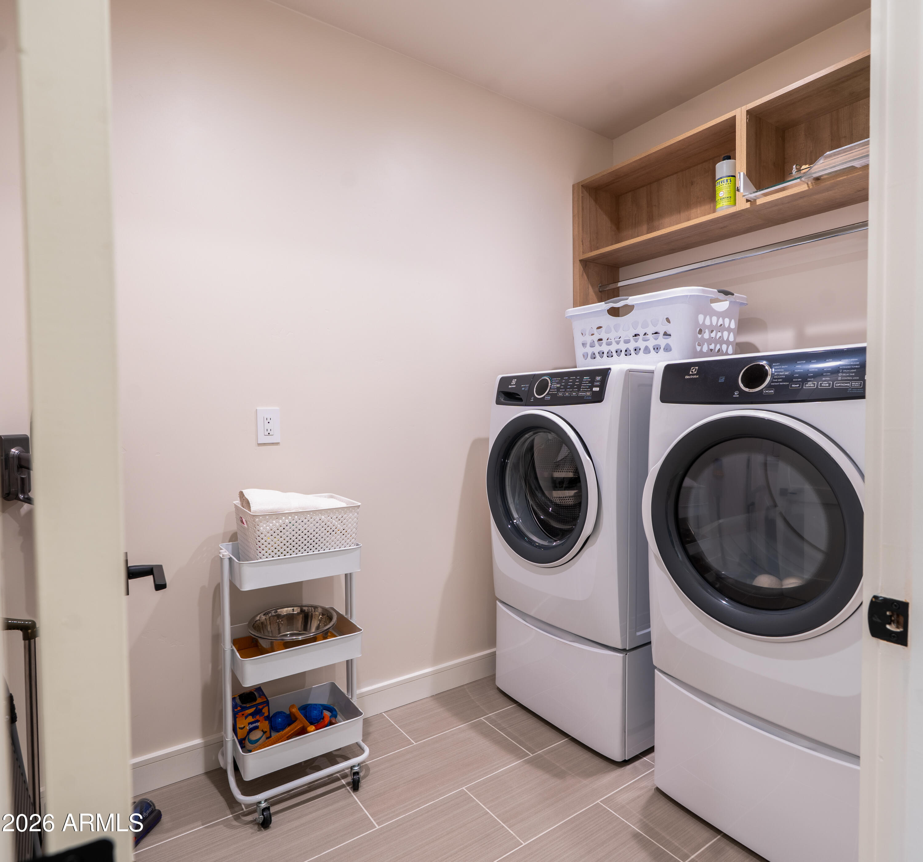 1733 East Bent Tree Circle, Unit 45 Flagstaff, AZ 86005 - Photo 20 of 37 a utility room with dryer and washer