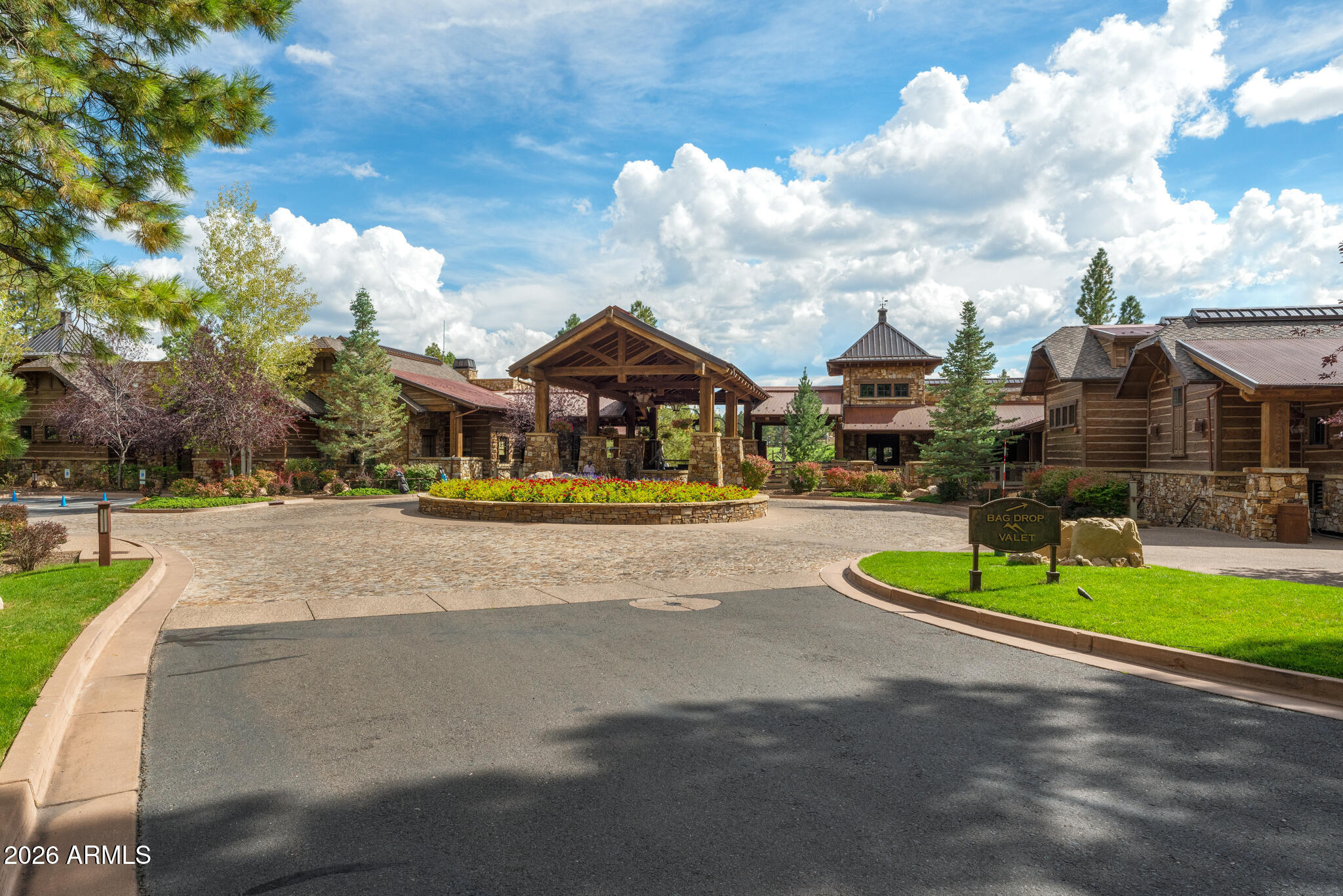 1733 East Bent Tree Circle, Unit 45 Flagstaff, AZ 86005 - Photo 29 of 37 a view of house with outdoor space and sitting area