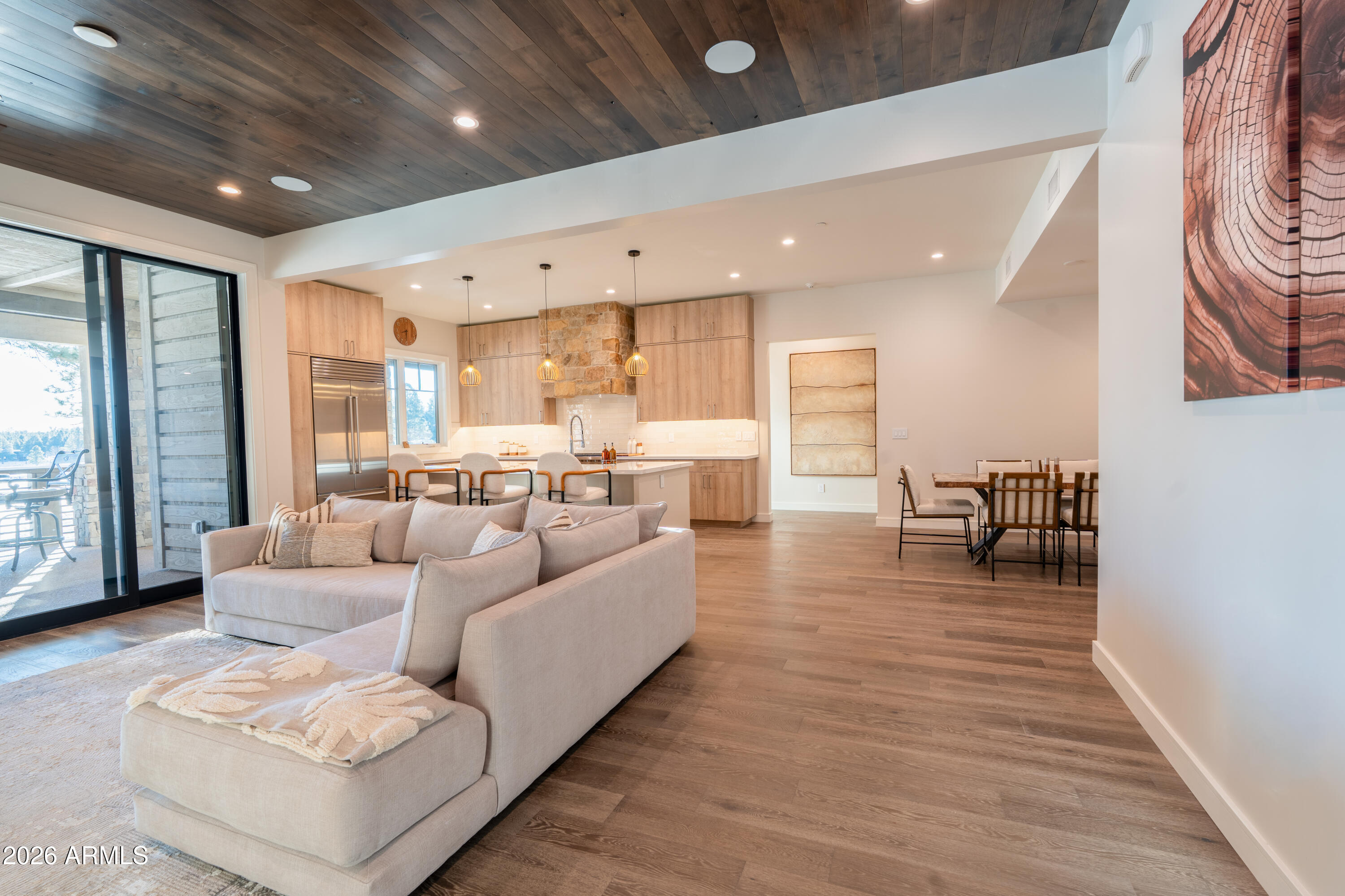 1733 East Bent Tree Circle, Unit 45 Flagstaff, AZ 86005 - Photo 8 of 37 a living room with furniture and a large window