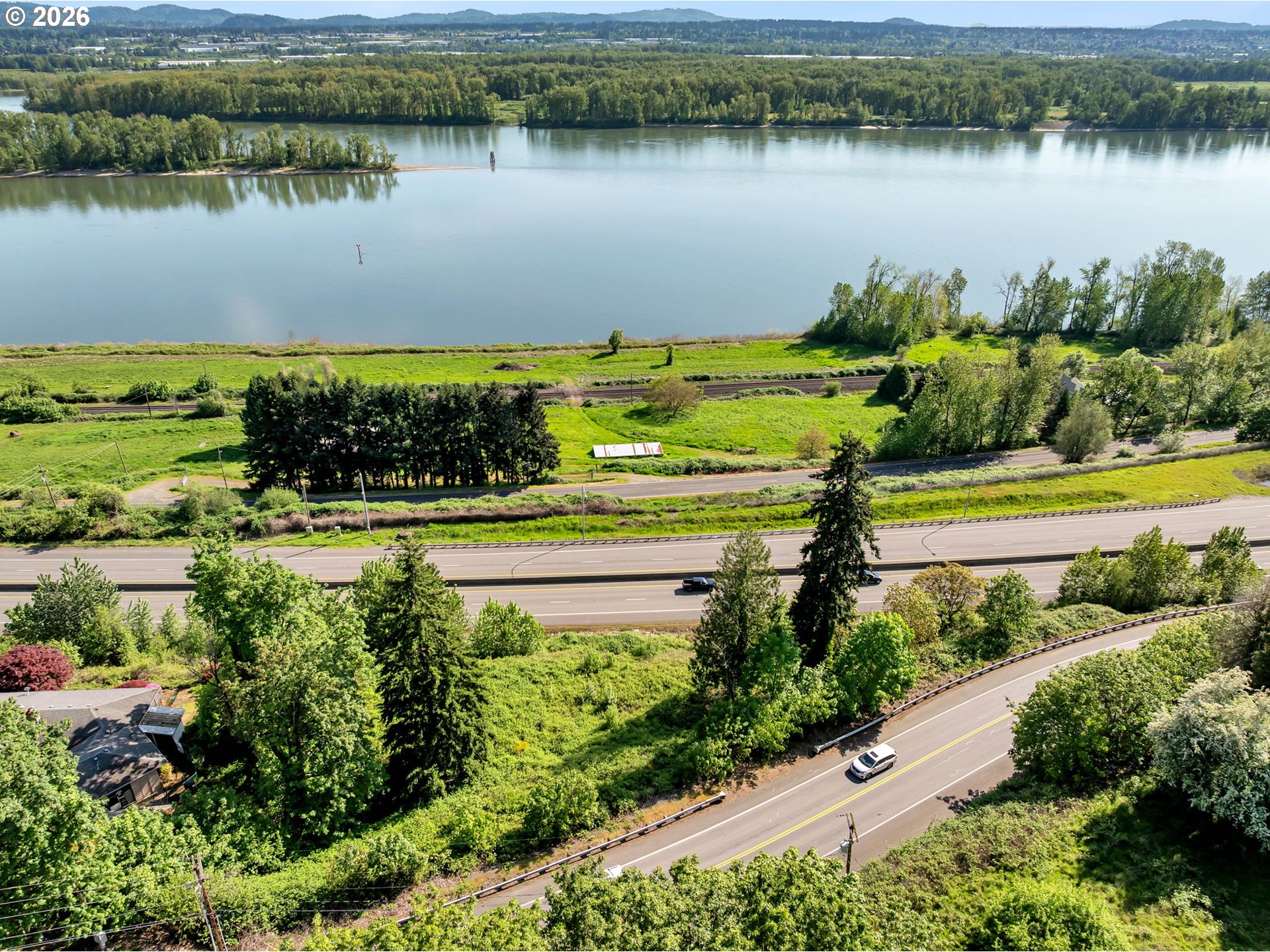 560 Northwest Brady Road Camas, WA 98607 - Photo 1 of 27 a view of a lake with a city view