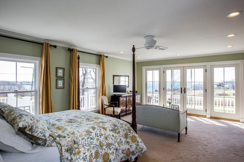 1780 Harpswell Neck Road Harpswell, ME 04079 - Photo 24 of 35 Inviting master bedroom with doors...