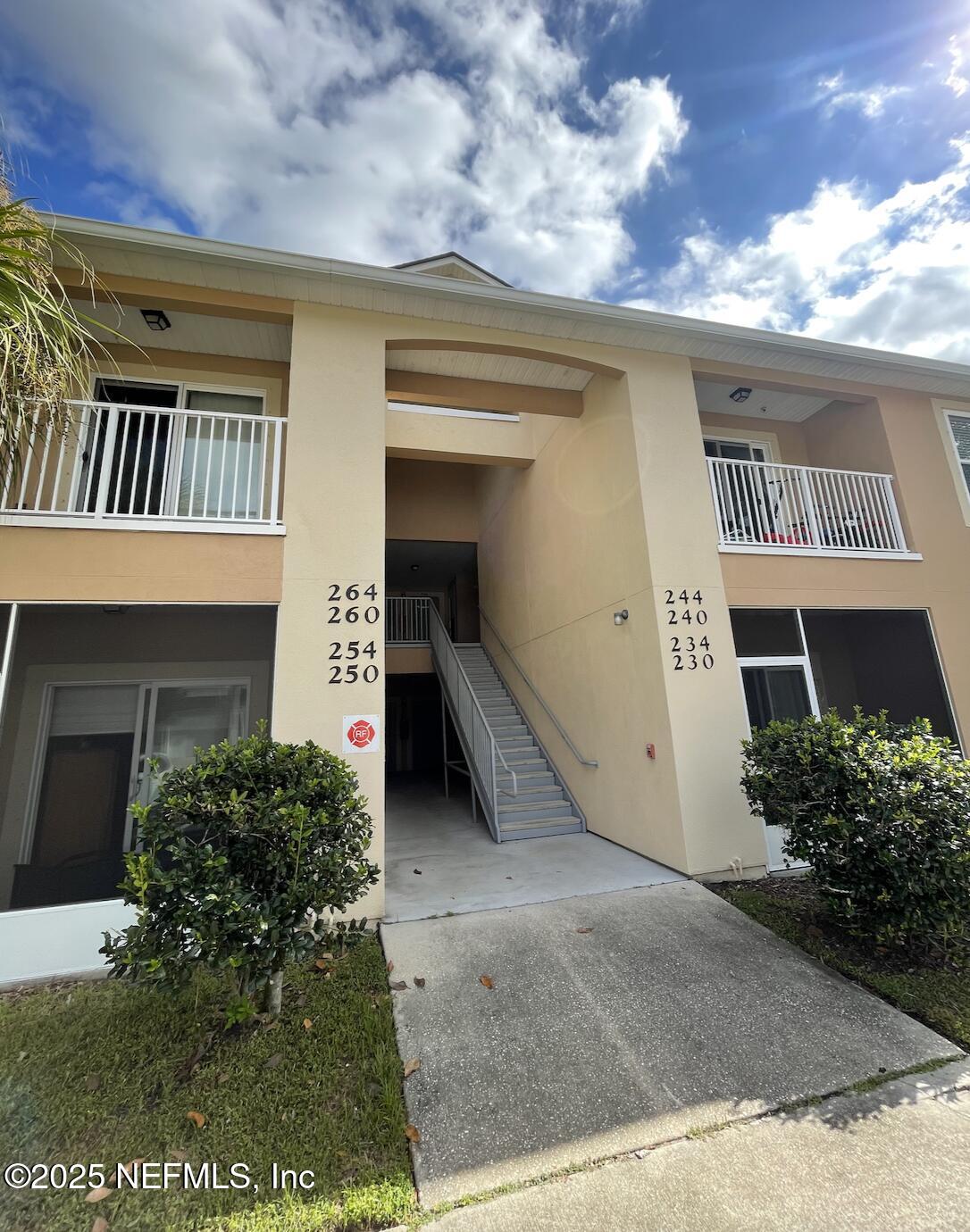 264 Golden Lake Loop, Unit 264 St. Augustine, FL 32084 - Photo 1 of 18 a view of a house with a yard