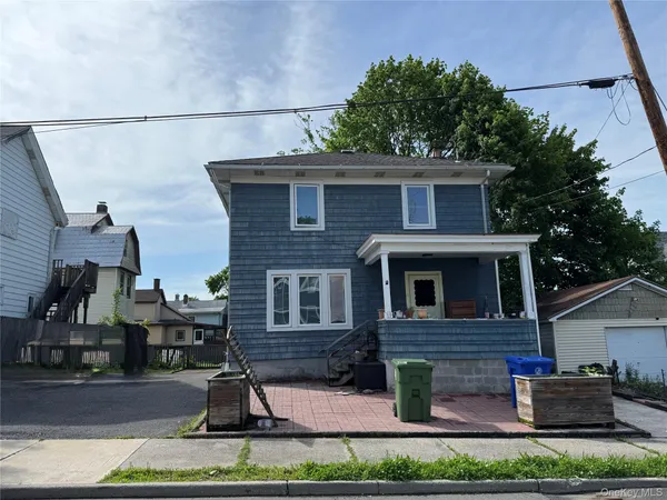 a view of house with outdoor space