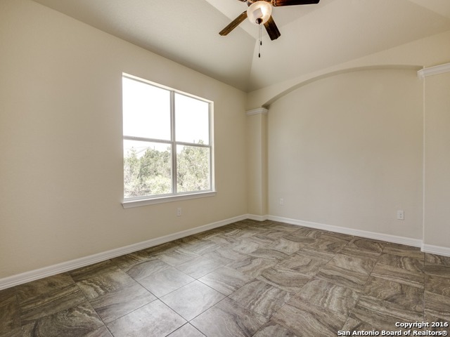 192 Weatherby Drive, Unit A Spring Branch, TX 78070 - Photo 13 of 25 a view of an empty room with a window