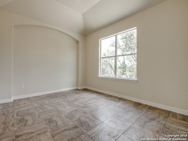 192 Weatherby Drive, Unit A Spring Branch, TX 78070 - Photo 21 of 25 an empty room with windows