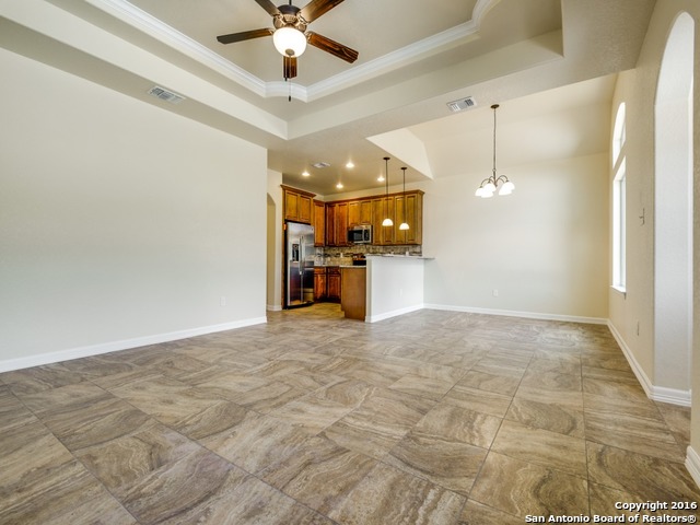 192 Weatherby Drive, Unit A Spring Branch, TX 78070 - Photo 7 of 25 a view of a kitchen with a sink and a ceiling fan