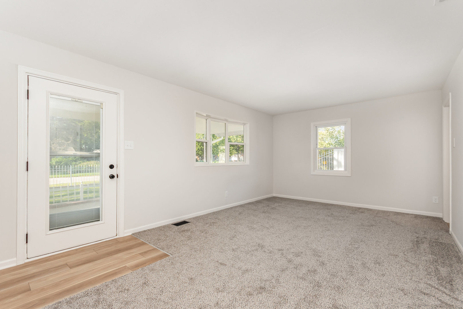 305 Luana Road Joliet, IL 60433 - Photo 3 of 16 an empty room with windows
