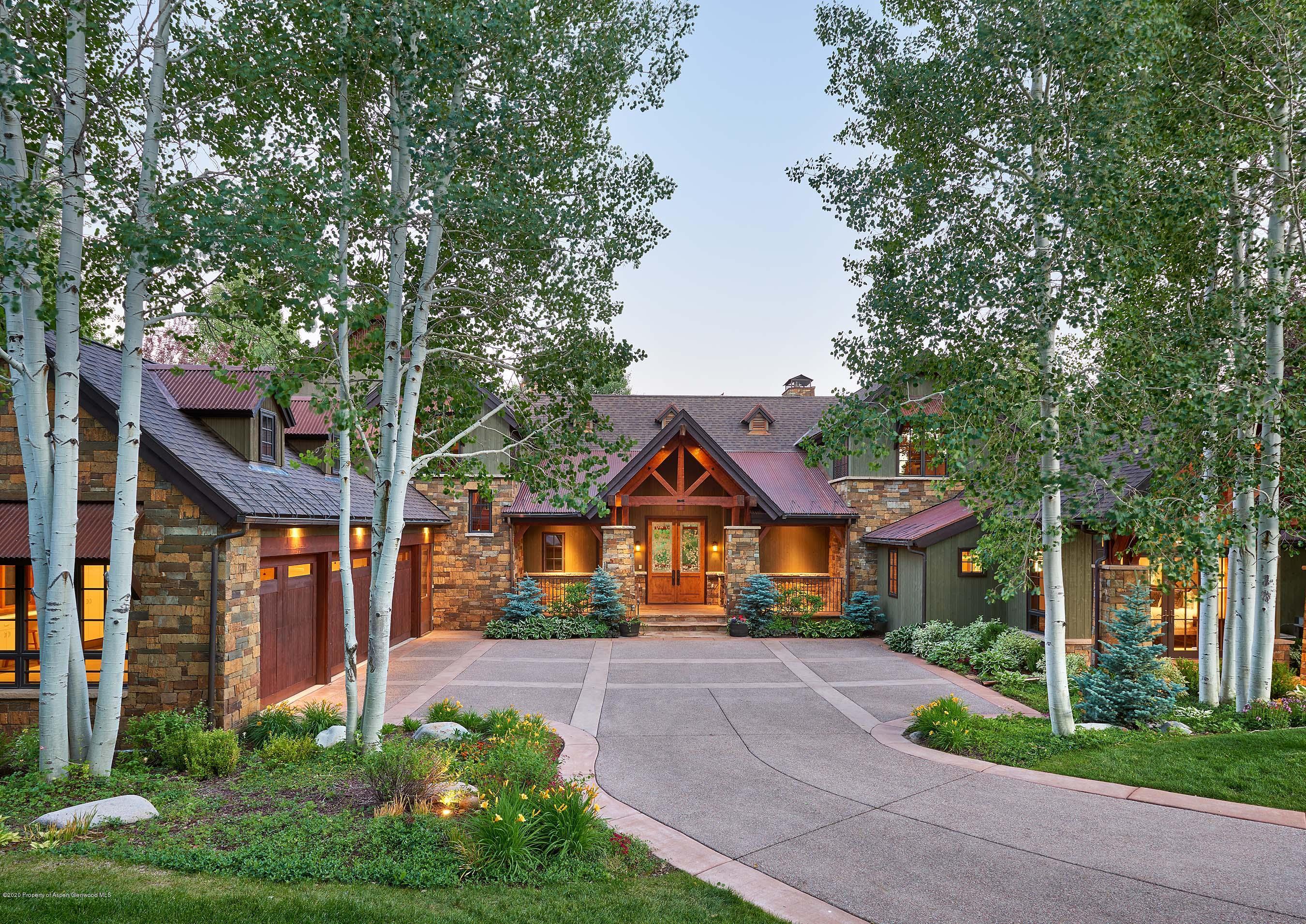 318 River's Bend Carbondale, CO 81623 - Photo 1 of 39 a front view of a house with a yard