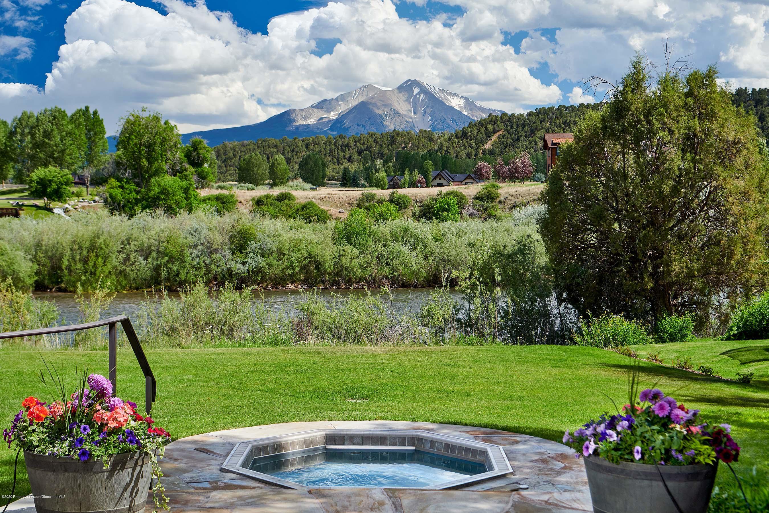 318 River's Bend Carbondale, CO 81623 - Photo 18 of 39 a view of a garden with a fountain