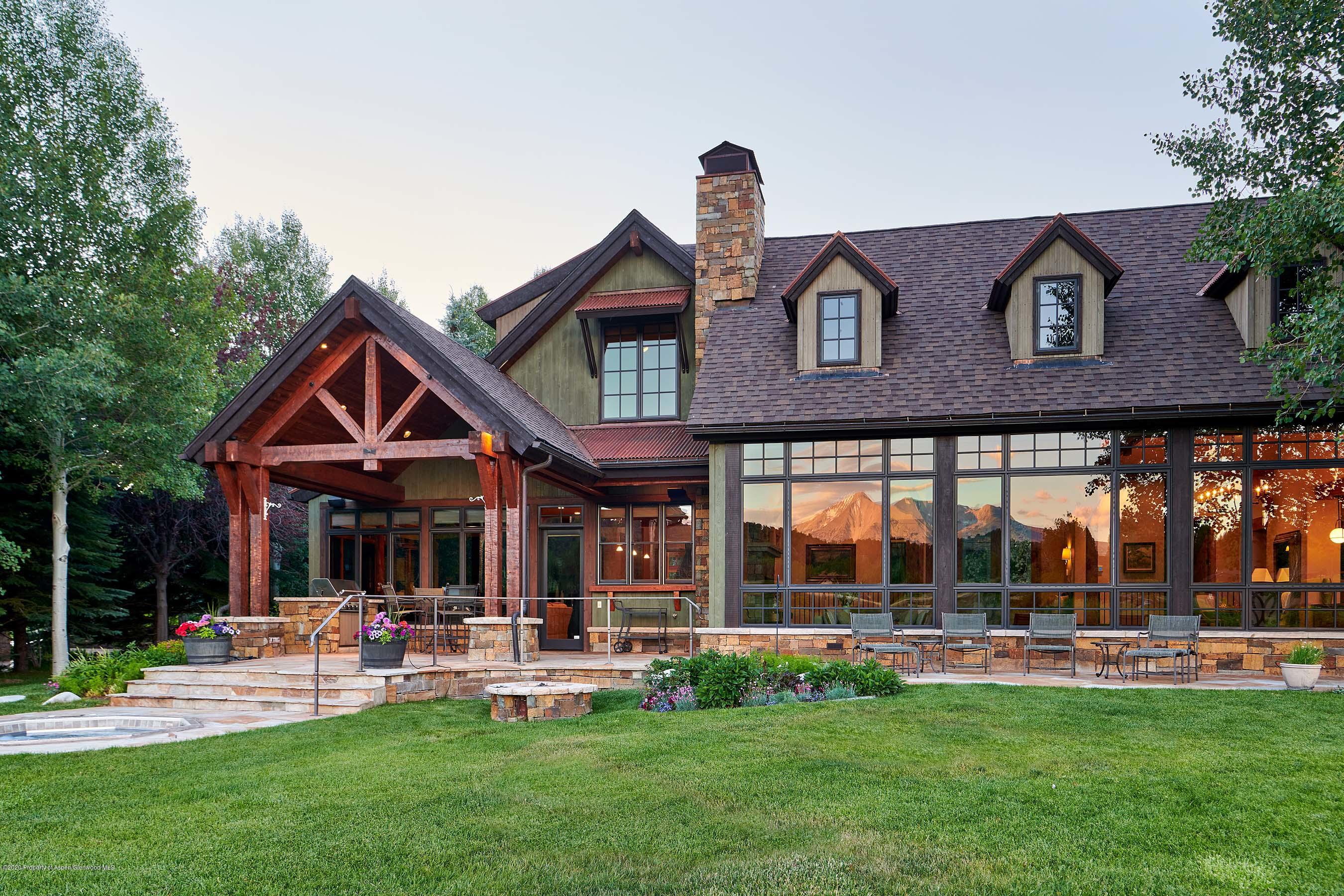 318 River's Bend Carbondale, CO 81623 - Photo 23 of 39 a front view of a house with swimming pool garden and patio