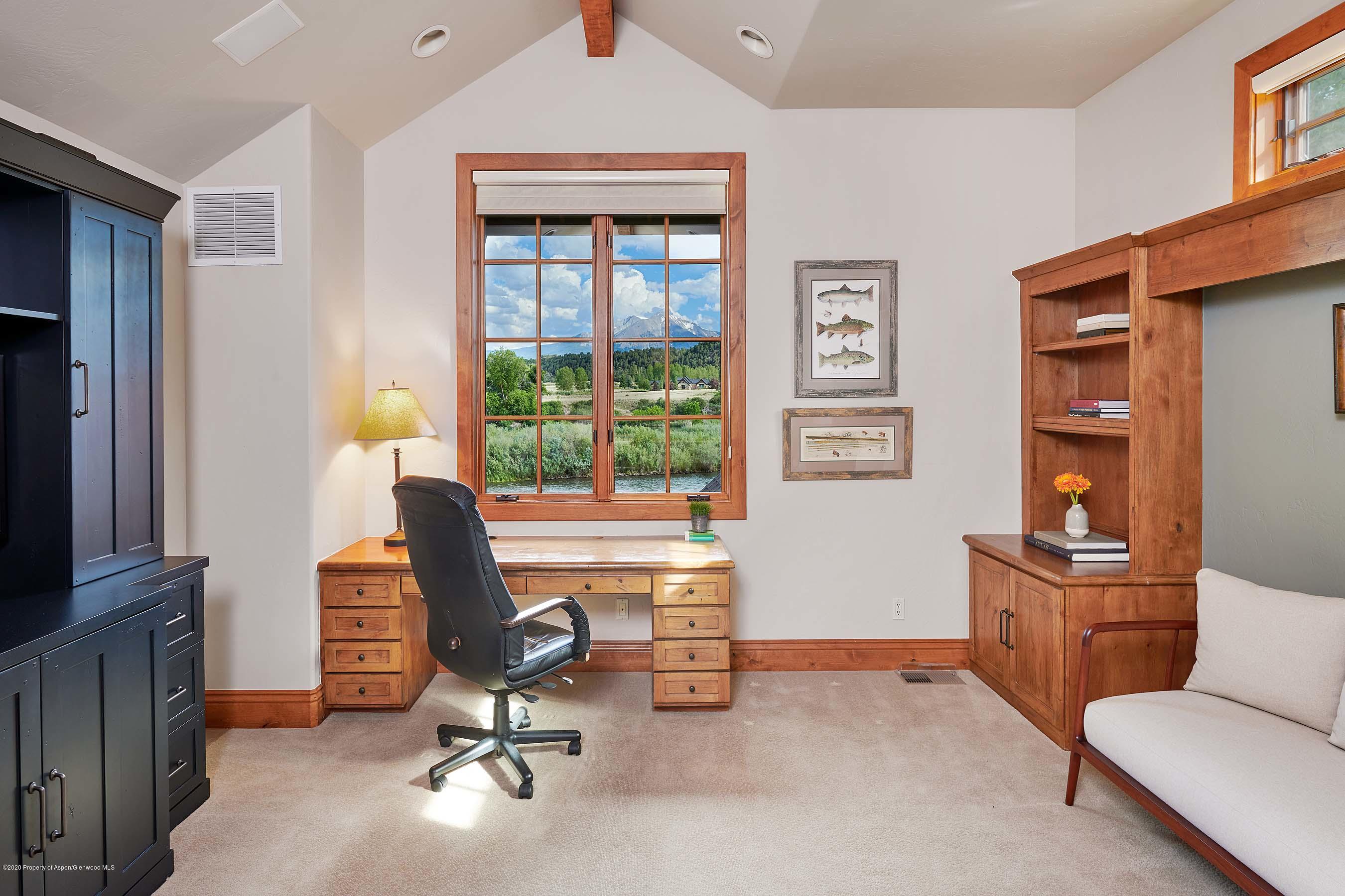 318 River's Bend Carbondale, CO 81623 - Photo 38 of 39 a view of a workspace with furniture and a window