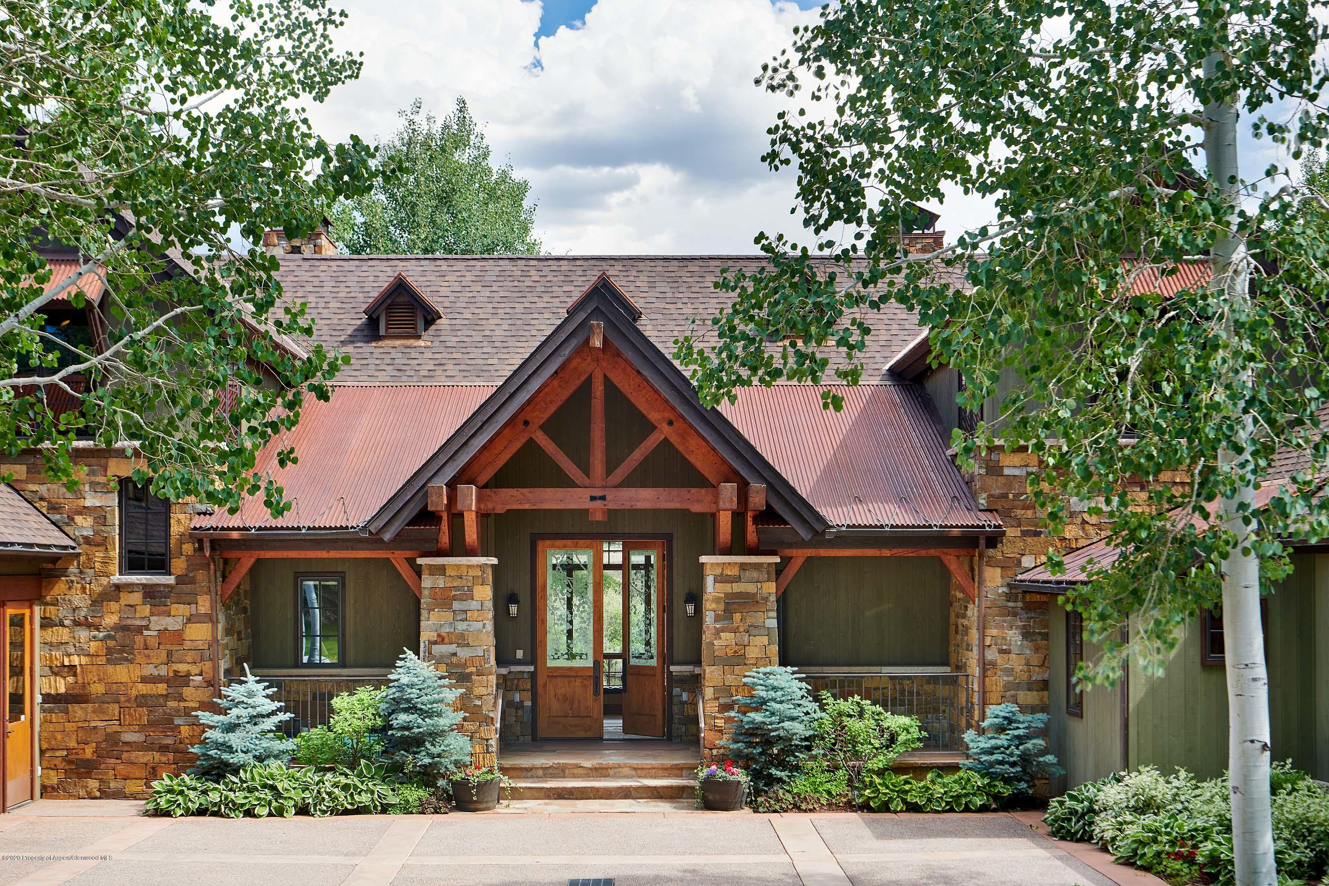 318 River's Bend Carbondale, CO 81623 - Photo 5 of 39 front view of a house with a yard