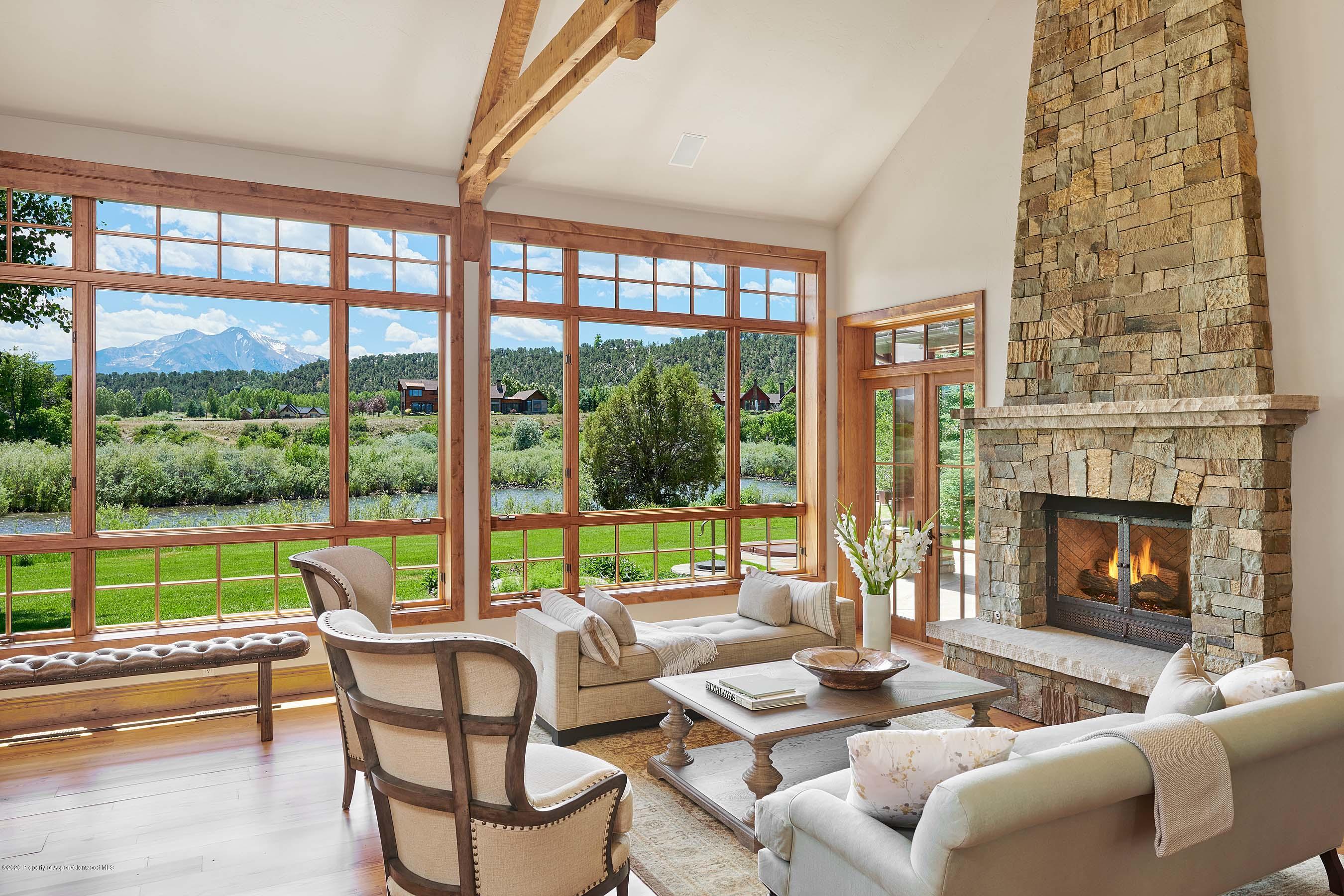 318 River's Bend Carbondale, CO 81623 - Photo 7 of 39 a living room with furniture and a fireplace